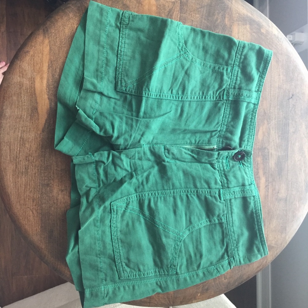 Green linen shorts